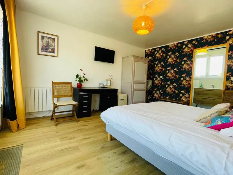 Chambre d'hôtes fleurie de charme au Manoir de la Houlette